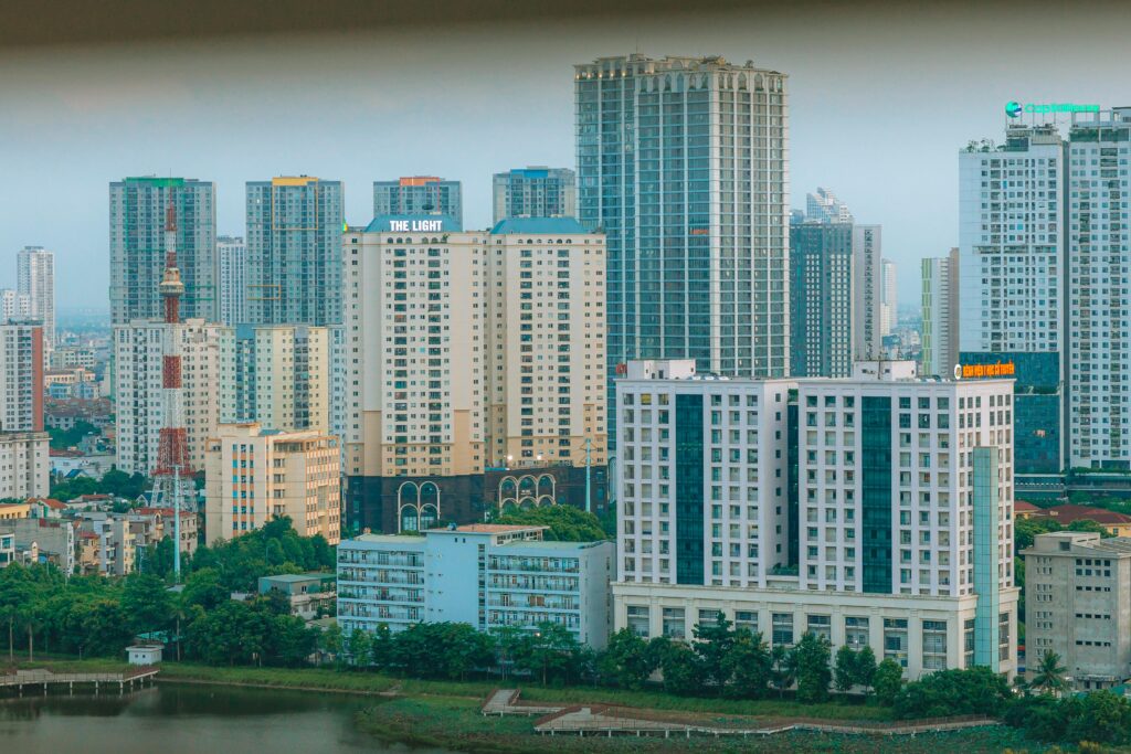 A contemporary cityscape featuring modern high-rise buildings and residential districts.